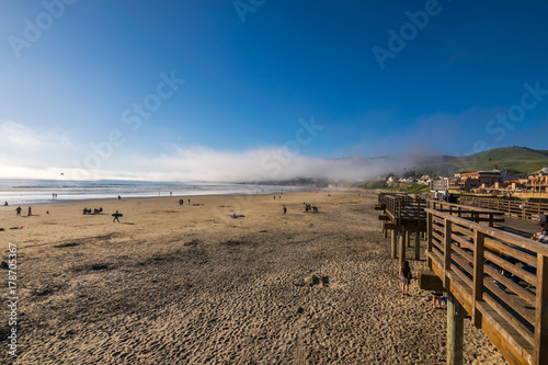 Waiting for the Sun to set at Pismo Beach, Oceano Dunes Natural Preserve, California, USA