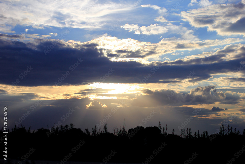 Set sunset background. Sky, clouds in field. Nature.