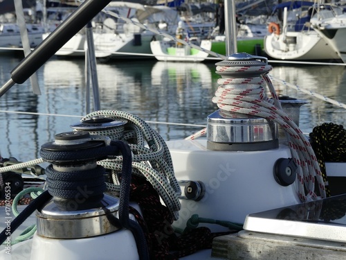 Details of winches and ropes on sailing boat racer, boating concept.