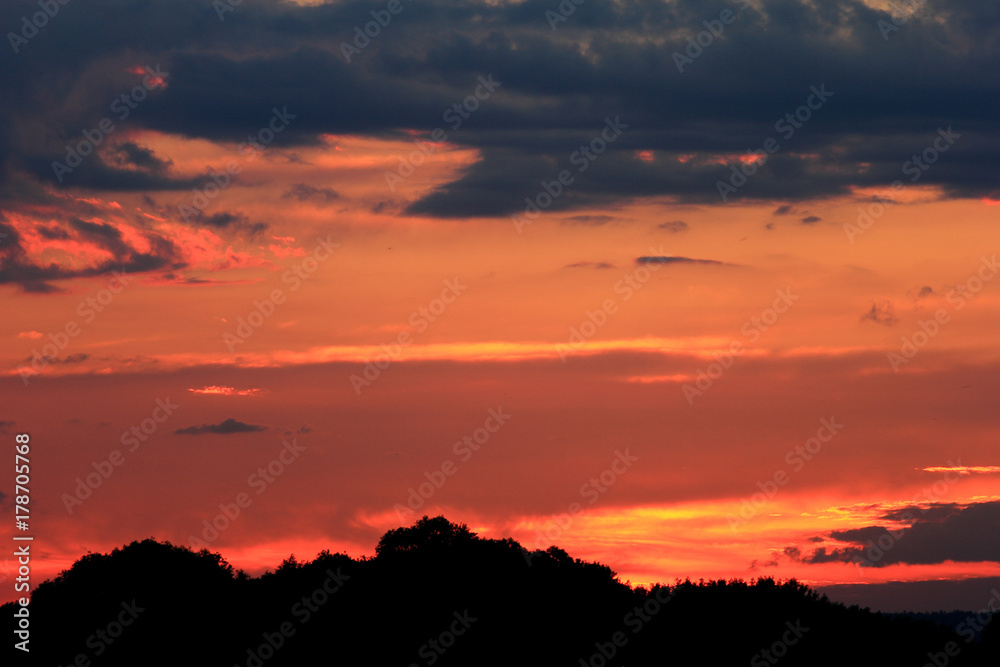 Set sunset background. Sky, clouds in field. Nature.