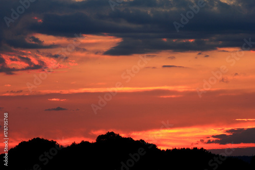 Set sunset background. Sky, clouds in field. Nature. © StarlingRu