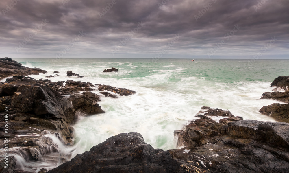 The Island St Ives view to sea with small fishing vessel