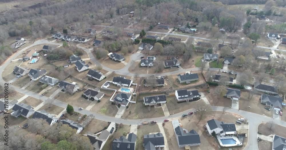 Aerial Drone Footage over a neighborhood in a rural area