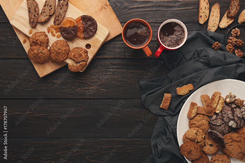 Fototapeta premium Oatmeals cookies and biscotti for warm winter evening