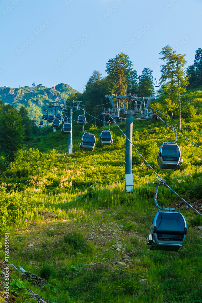 Obraz premium Bottom view of the cableway on the mountainside in Rosa Khutor, Russia