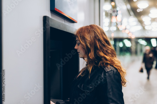 young woman beautiful using atm machine - customer, buying, transaction concept