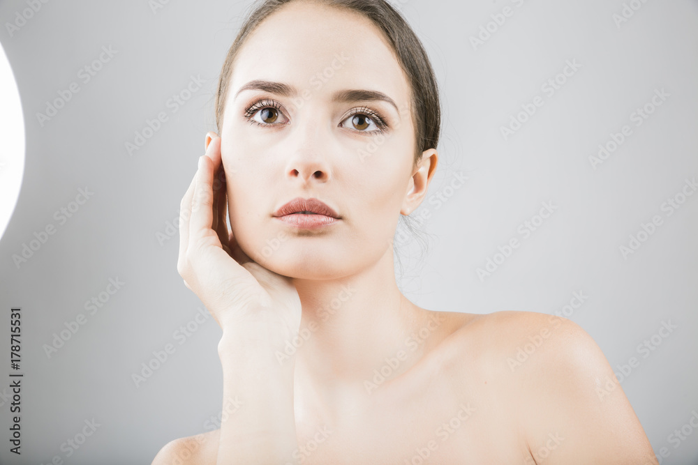 a beauty girl  on the grey background
