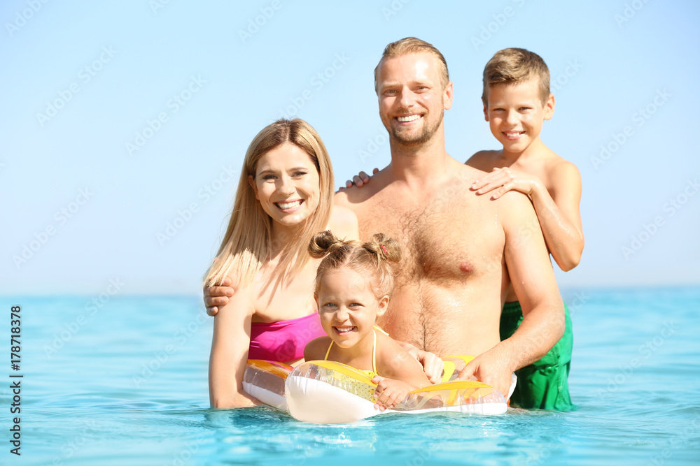 Happy family resting at sea resort Happy family resting at sea resort