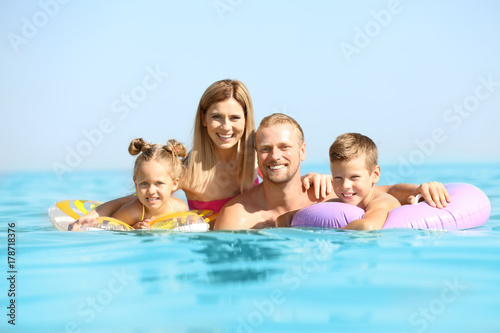 Happy family resting at sea...