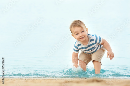 Cute little boy on beach