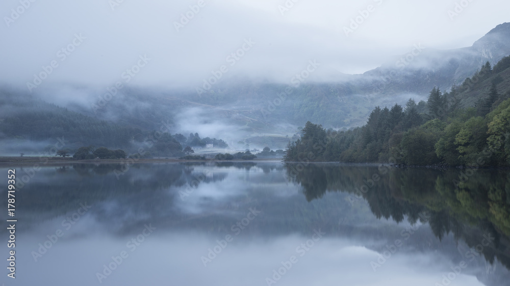 Landscape of Llyn Crafnant during foggy Autumn morning in Snowdonia National Park