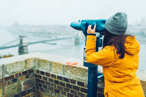 woman at observation deck enjoy view of the city