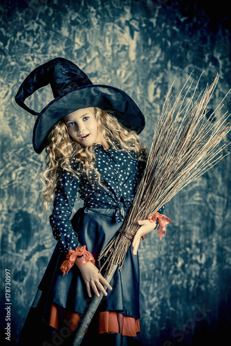 pretty witch with broom