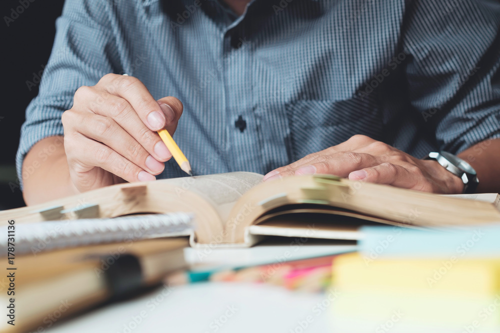 Reading a book. Education, Academic, Learning Reading and Exam concept. Reading a book. Education, Academic, Learning Reading and Exam concept.