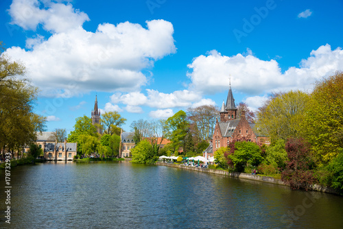 Minnewater castle at the Lake of Love in Bruges, Belgium