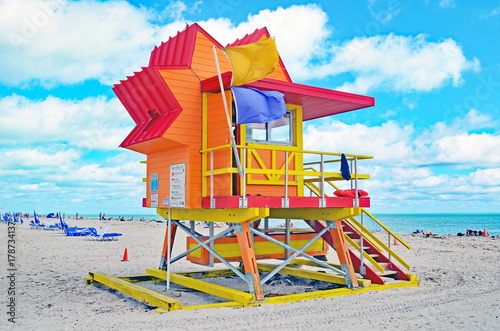 Colorful orange ocean-rescue station with red and yellow trim on the beach in Miami Beach,Florida © Wimbledon