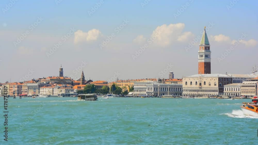 famous San Marco tower and Doge's palace waterfront at sunny day, Venice, Italy. famous San Marco tower and Doge's palace waterfront at sunny day, Venice, Italy.