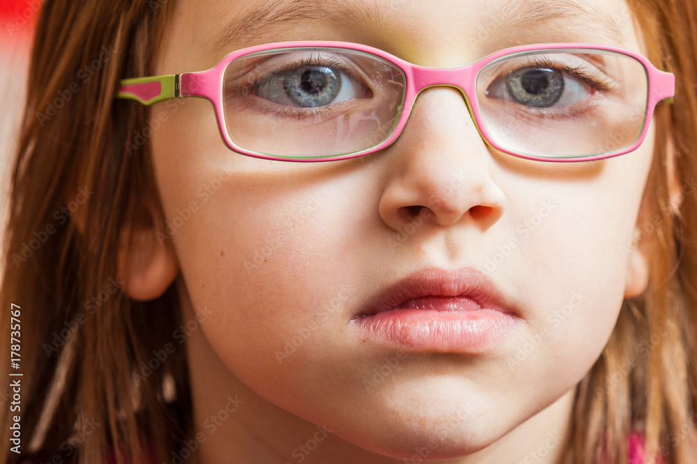 Closeup of young toddler girl in eyeglasses Closeup of young toddler girl in eyeglasses