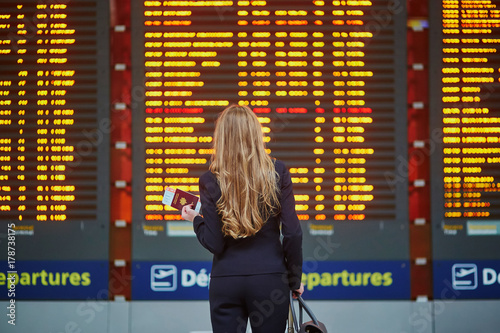 Young elegant business woman in international airport