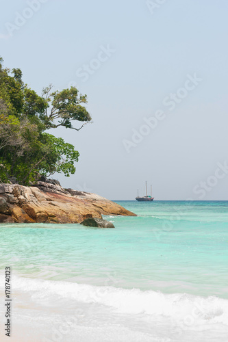 Tropical beach and sailboat © Oleksandr Drozdov