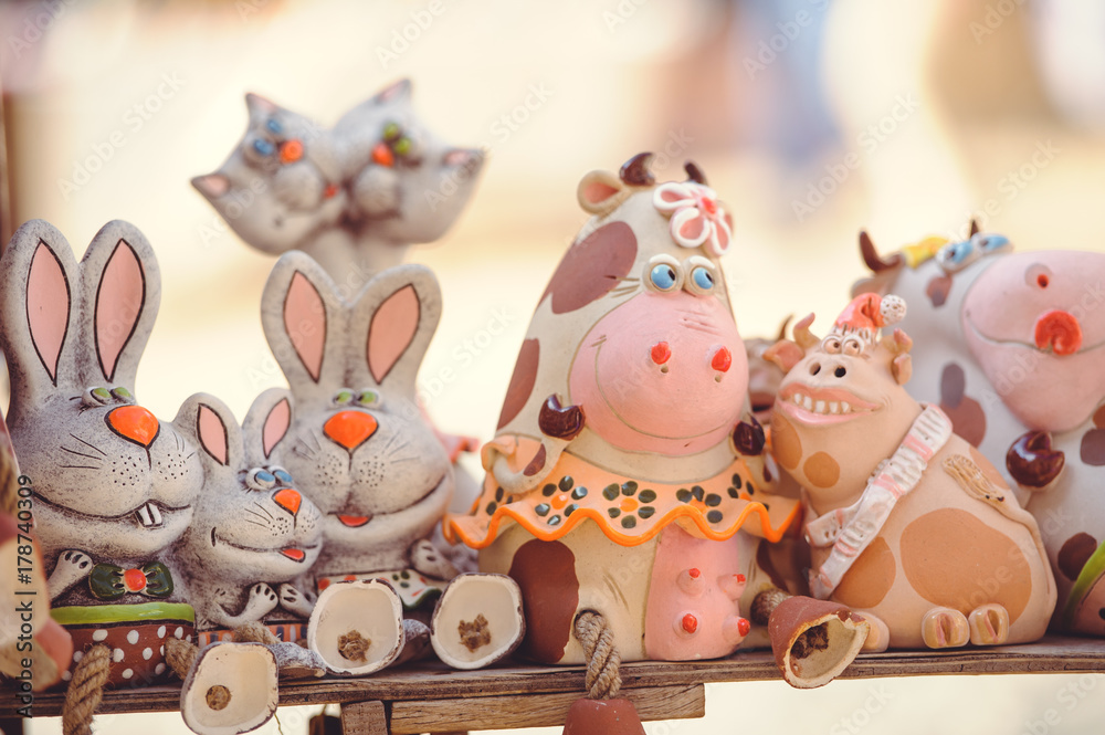 Fototapeta premium sale clay dolls souvenirs from clay, tourist places Ukraine