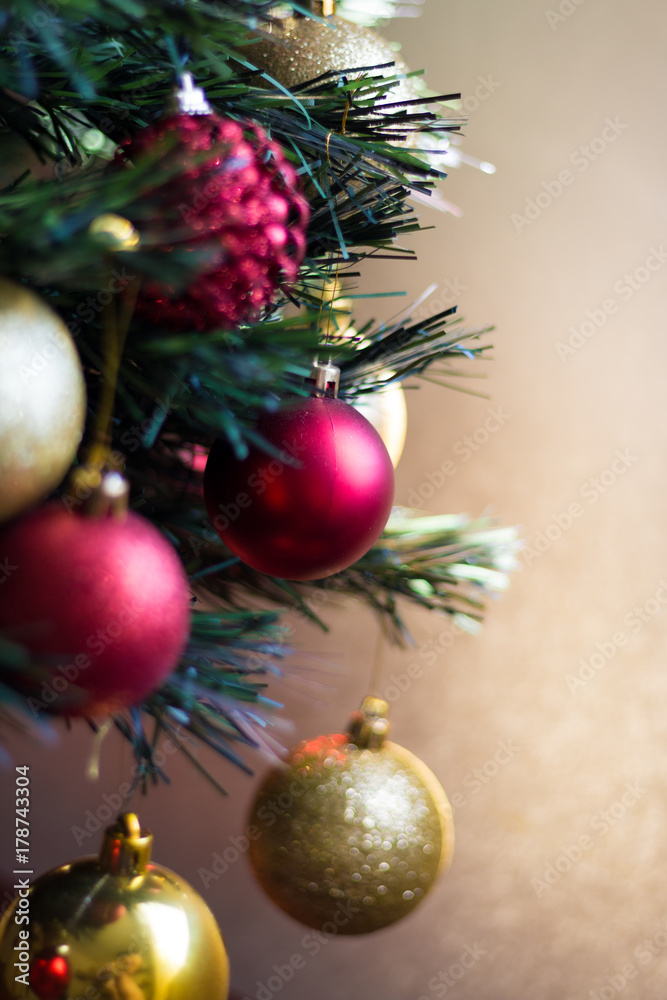 Fototapeta premium Beautiful christmas tree with ornaments (vertical photo)