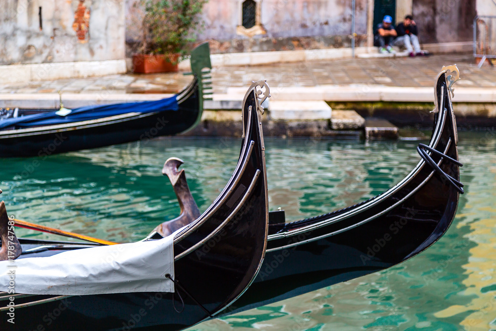 Canal with gondolas in Venice, Italy. Tourism concept in Europe.