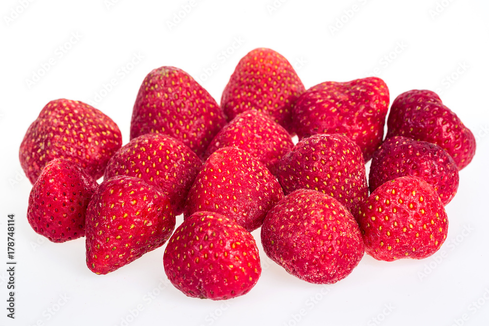 Strawberries, frozen. Macro,frozen organic strawberries,a handful of sweet, luscious frozen strawberries isolated on white background,frozen strawberries background,Abstract background from strawberry