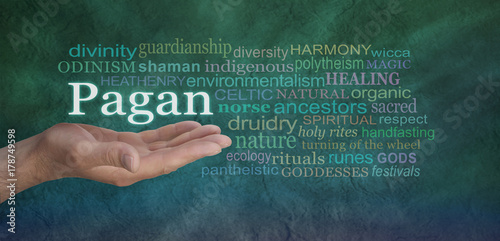 Pagan Word Cloud - Male hand outstretched on a green stone effect background with the word PAGAN floating above surrounded by a relevant word cloud
