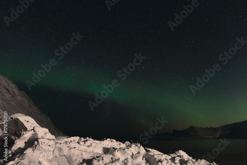 Aurora borealis-Polar lights-Northern lights over Ytresandheia-Roren mounts. Yttresand-Flakstadoya island-Lofoten-Norway. 0472