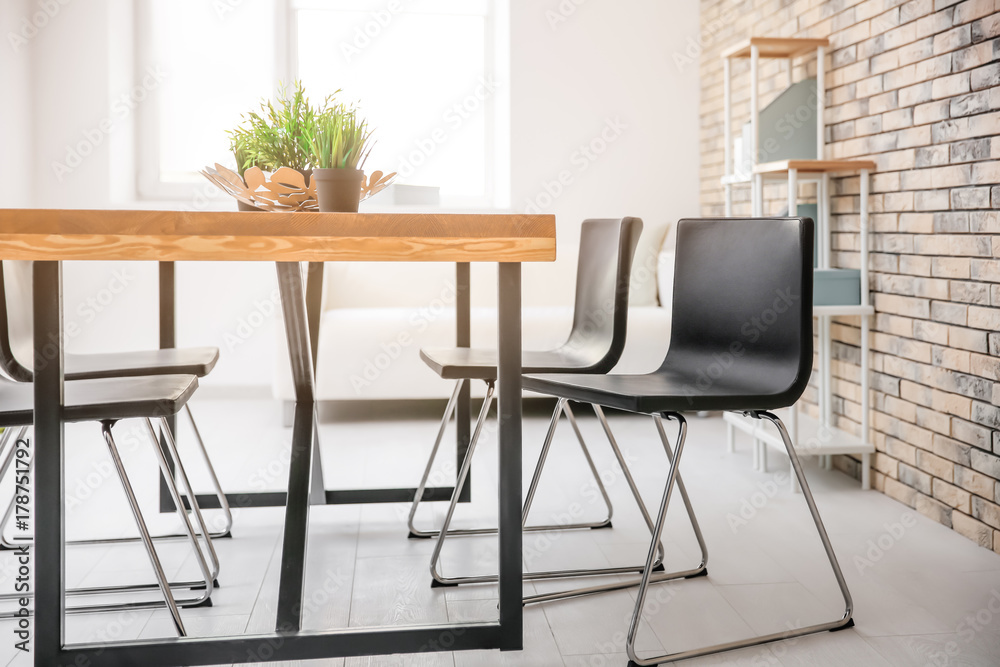 Modern room interior with wooden table Modern room interior with wooden table