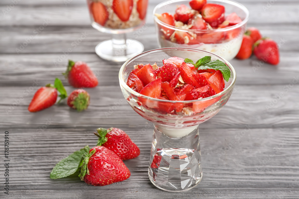Delicious dessert with fresh strawberry on table Delicious dessert with fresh strawberry on table