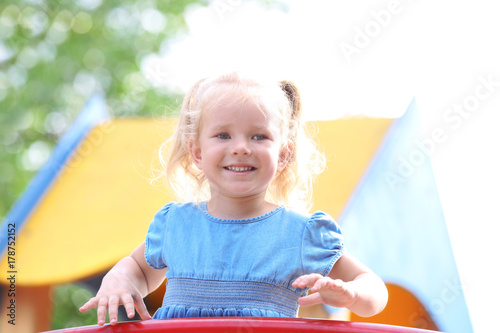 Adorable little girl on pla...