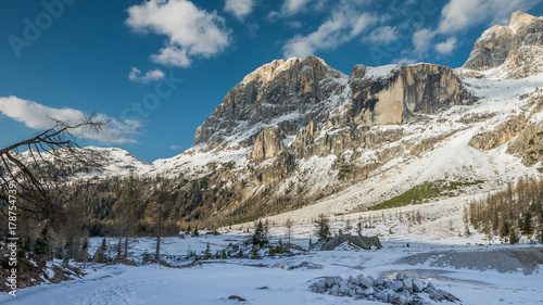 At the edge of seasons, autumn winter and spring mountain valley