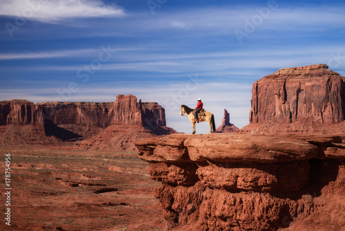 Native American riding horse in Monument Valley