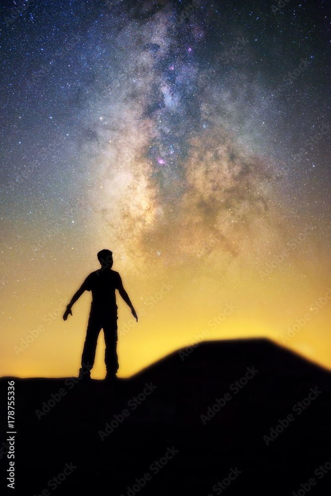 Milky way and human in silhouette
