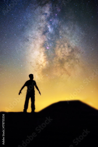 Milky way and human in silhouette