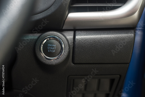 Engine Start Stop button of a Car can use with finger pressing the start button © Mahachoke 4289-6395