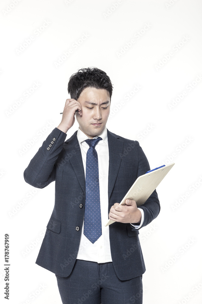 asian business man hand hold a clipboard isolated white. asian business man hand hold a clipboard isolated white.