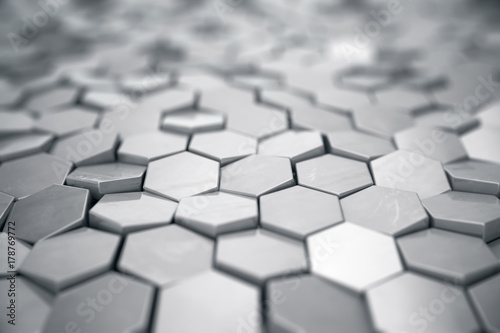 Silver abstract hexagonal background with depth of field effect. Structure of a large number of hexagons. Steel honeycomb wall texture, shiny hexagon clusters background, 3D rendering
