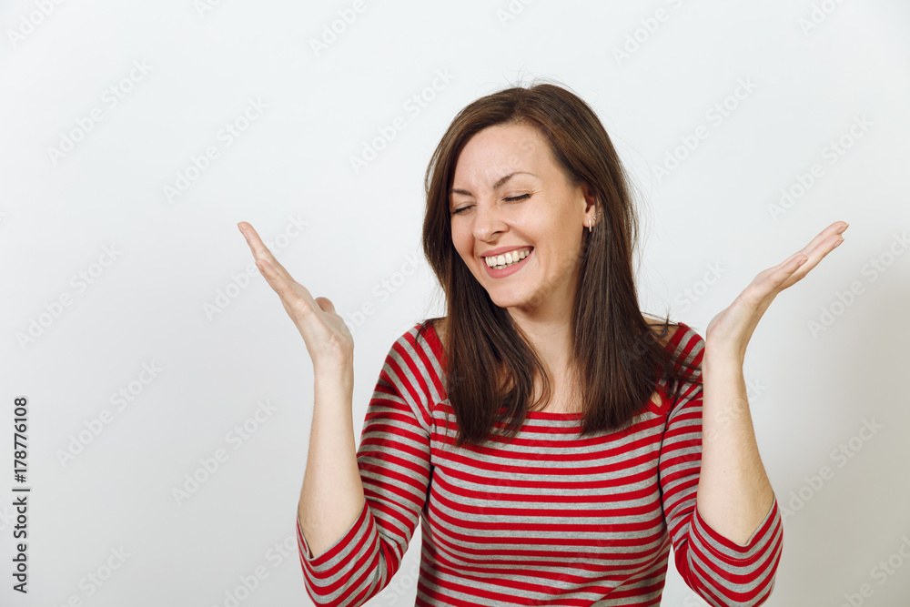 Gorgeous European young happy brown-haired woman with healthy clean skin and charming smile, dressed in casual red and grey clothes, laughing and enjoying on a white background. Emotions concept. Gorgeous European young happy brown-haired woman with healthy clean skin and charming smile, dressed in casual red and grey clothes, laughing and enjoying on a white background. Emotions concept.