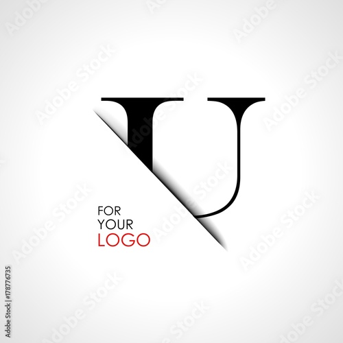 Capital u letter is inserted in the paper slot. To create logos, emblems, monograms.