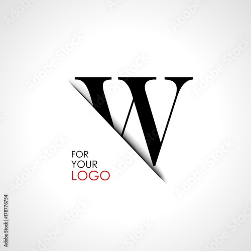 Capital w letter is inserted in the paper slot. To create logos, emblems, monograms.