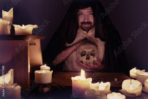 Spiritualist mystic man witcher talking with ghosts and demons