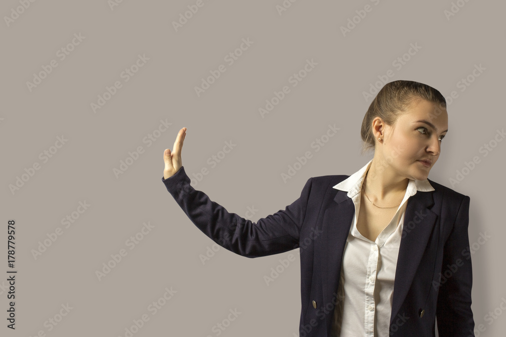 portrait shot. young beautiful business woman with short hair combed back, wearing a jacket. portrait shot. young beautiful business woman with short hair combed back, wearing a jacket.
