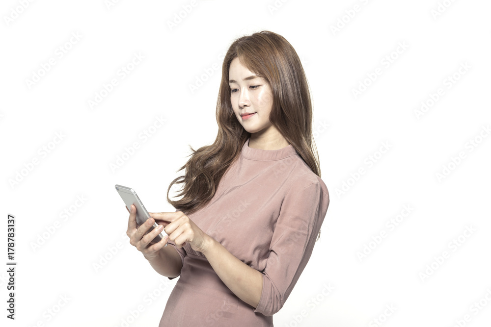 business woman standing up with smart phone isolated white. business woman standing up with smart phone isolated white.