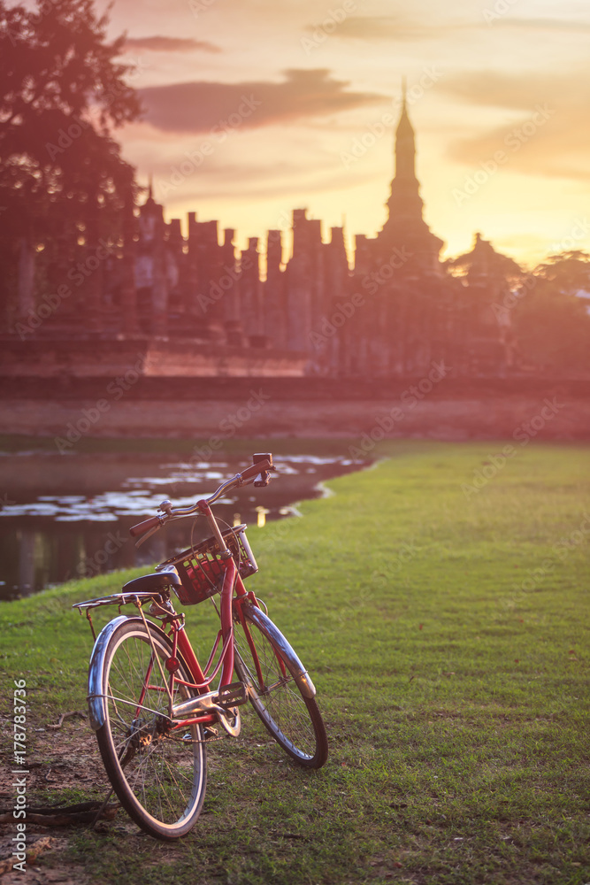 Vintage bicycle in Sukhothai Historical Park at Sunset time, Sukhothai, Thailand