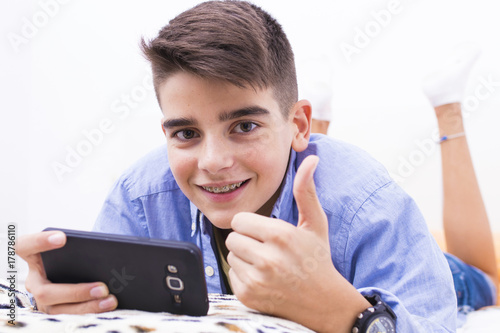 teenage boy with smart phone