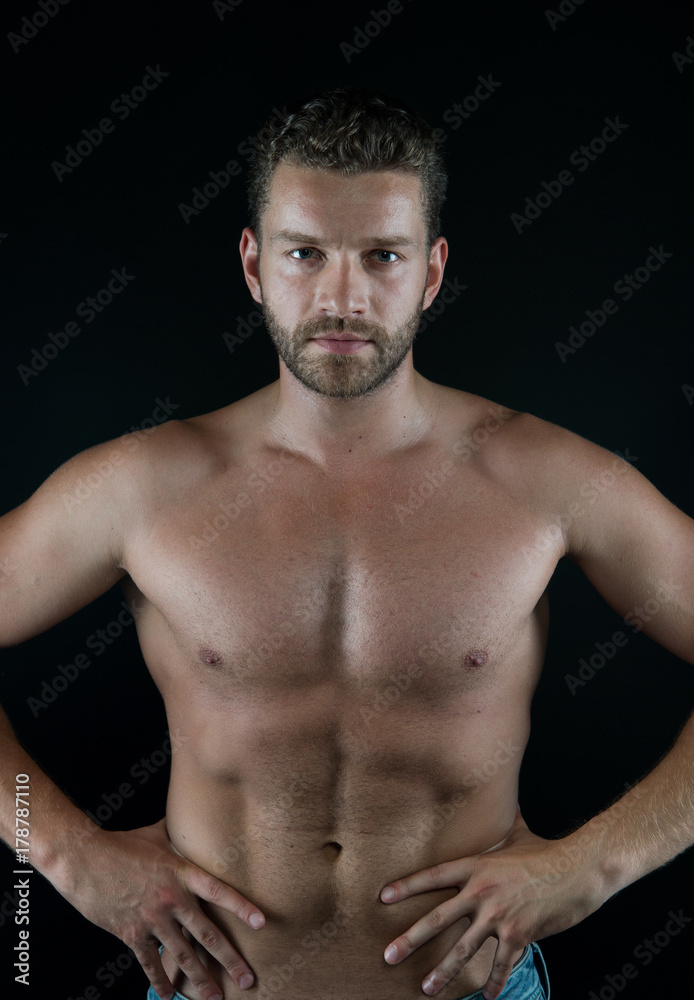 Sportsman with muscular bare torso, ab, six pack, chest, belly