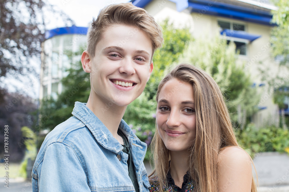 Outdoor Portrait Of Romantic Teenage Couple